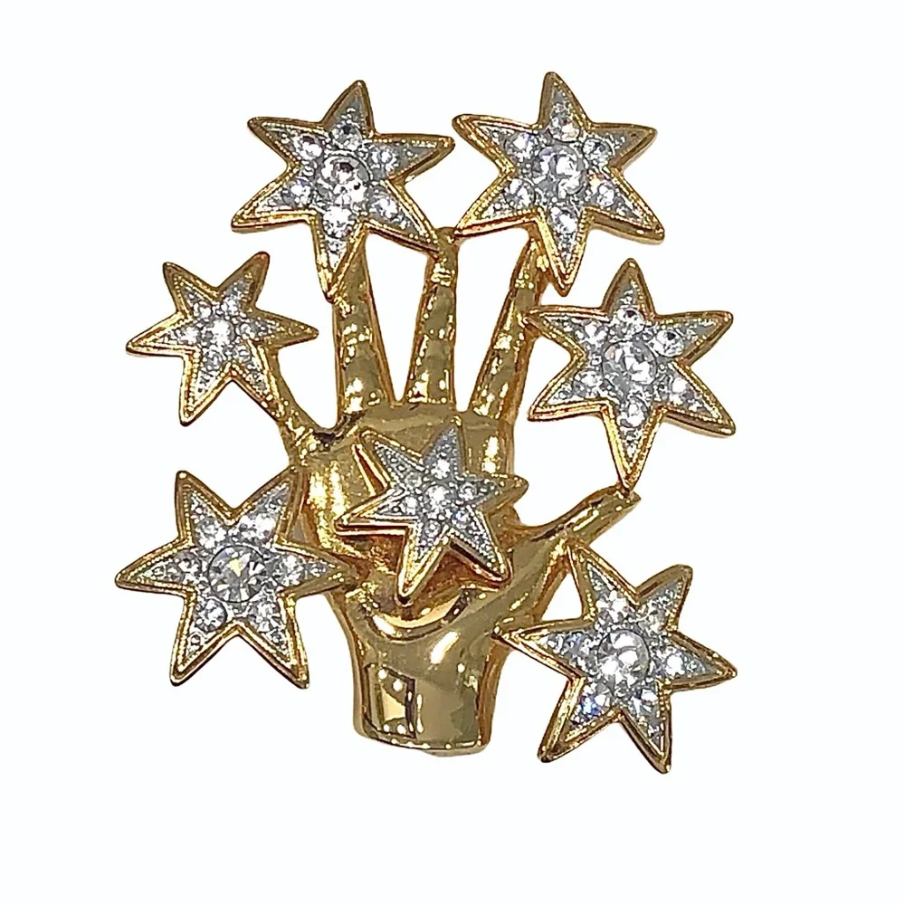 NOLAN MILLER SHINY GOLDEN HAND WITH CRYSTAL STARS BROOCH